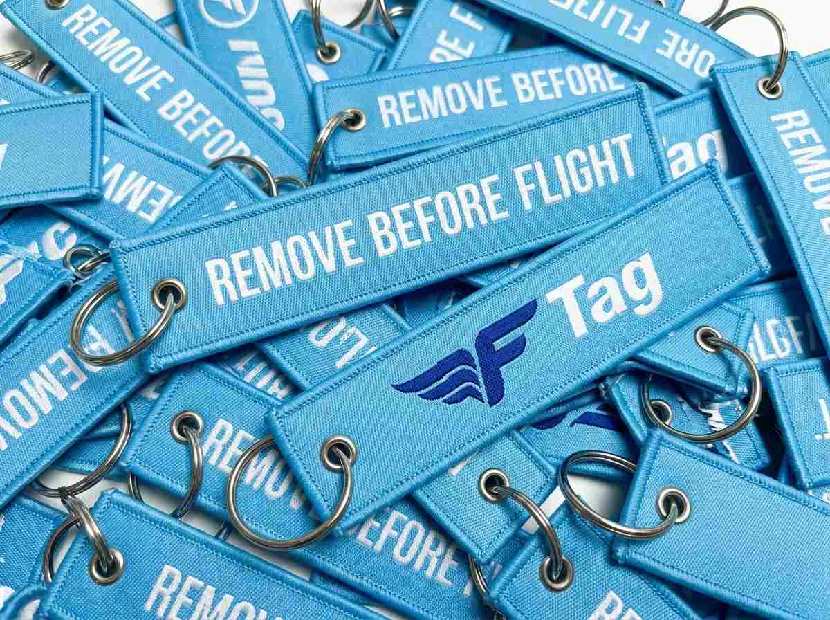 Blue custom woven jet keychains in bulk